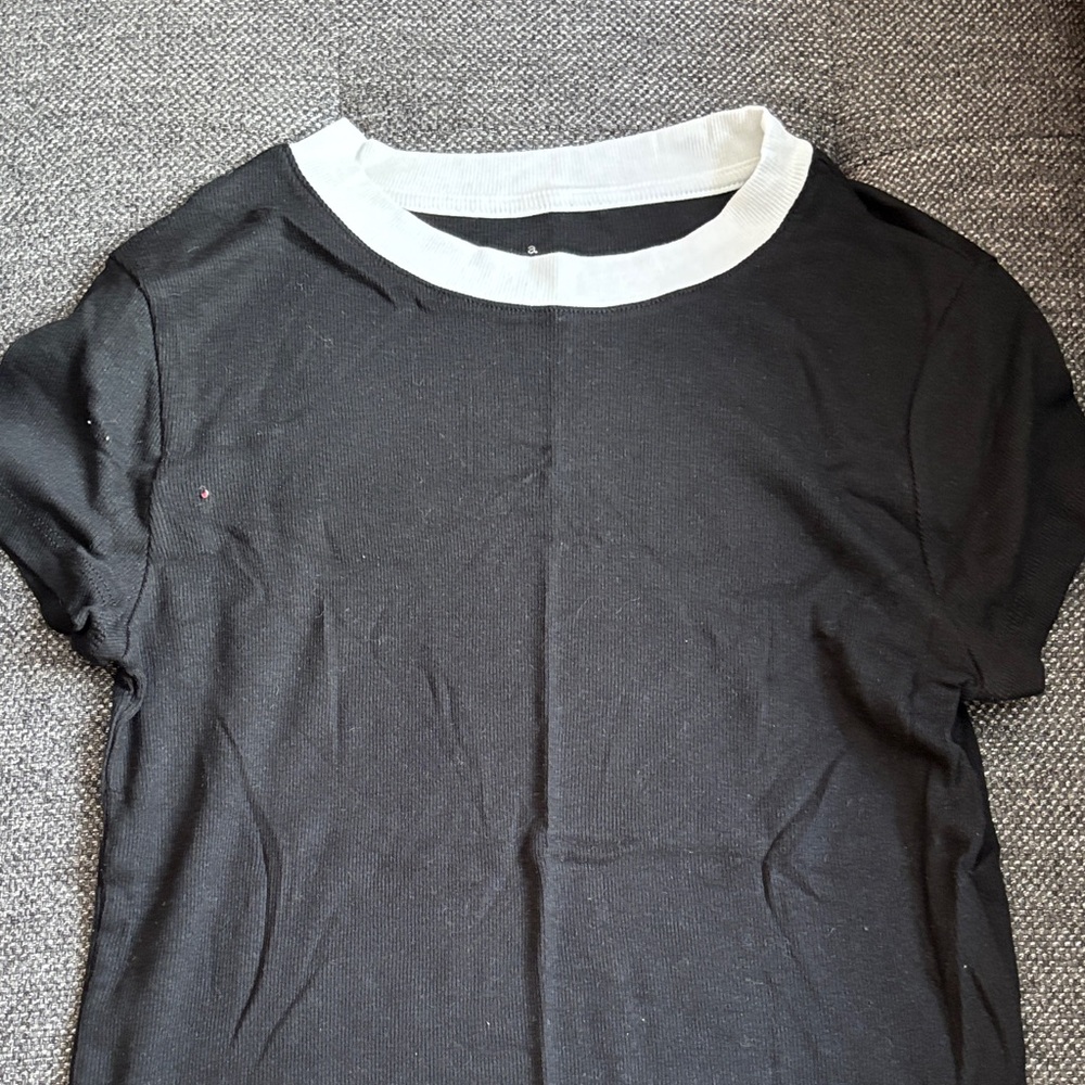 a new day Black Tee with White Trim